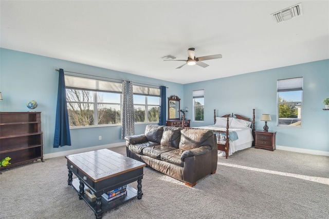 bedroom featuring carpet floors, baseboards, and visible vents