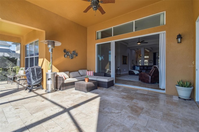 view of patio / terrace featuring ceiling fan and outdoor lounge area