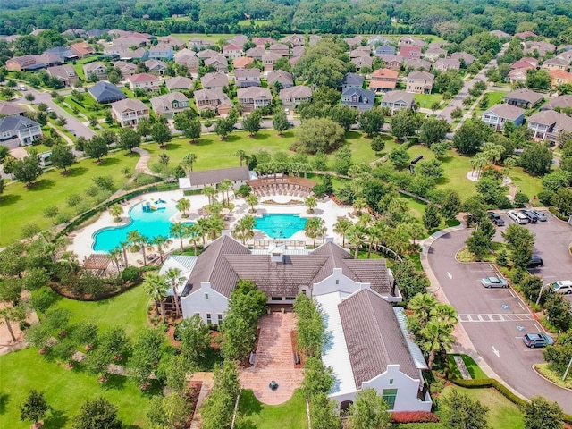 birds eye view of property with a residential view