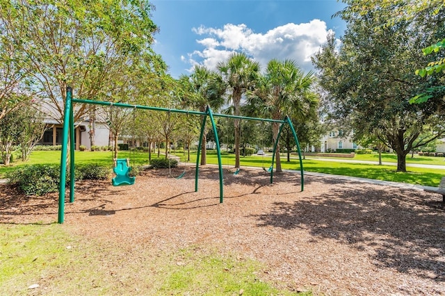 community play area featuring a lawn