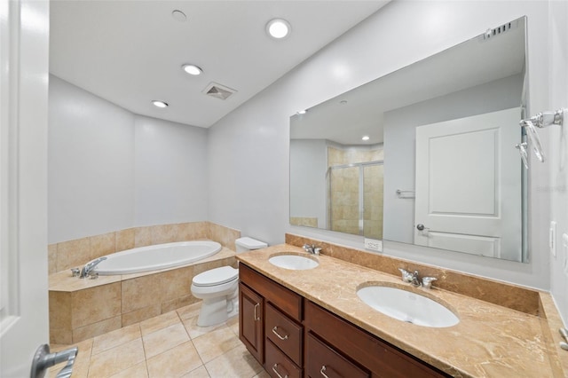 full bathroom featuring tile patterned flooring, vanity, toilet, and separate shower and tub