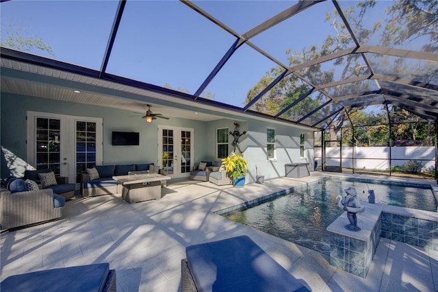 view of pool with a fenced in pool, a patio, glass enclosure, an outdoor hangout area, and french doors