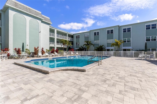 view of swimming pool featuring a patio