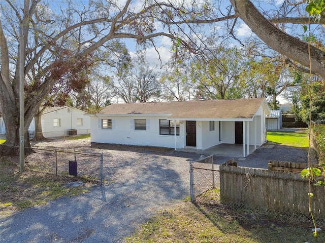 single story home featuring central air condition unit