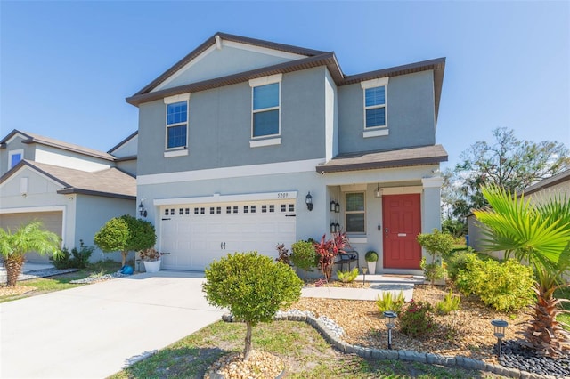 front of property featuring a garage