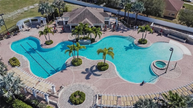 view of swimming pool featuring a patio area