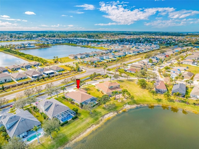 drone / aerial view with a water view