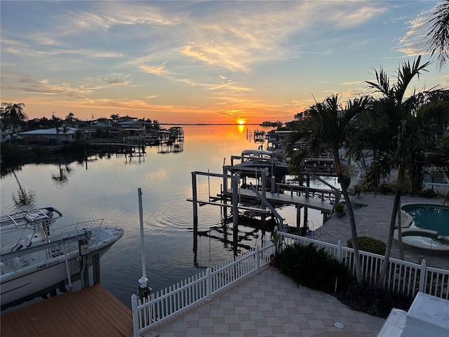 dock area with a water view