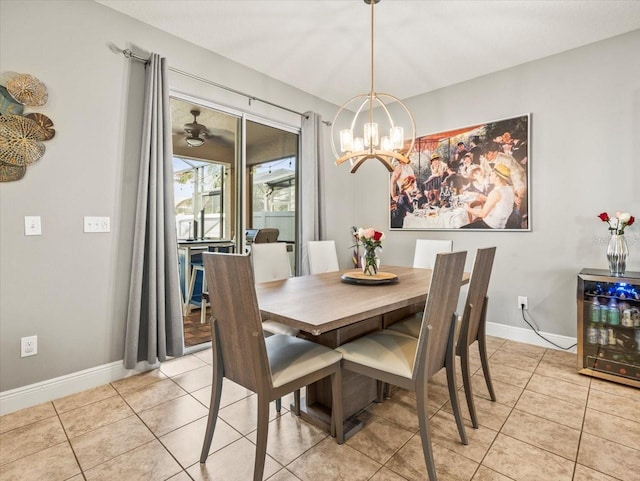 dining room with light tile patterned flooring and an inviting chandelier