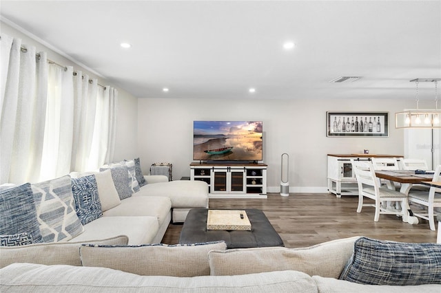 living room featuring dark hardwood / wood-style floors