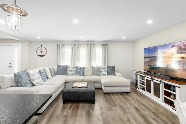 living room with light hardwood / wood-style flooring