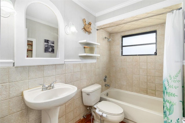 full bathroom with shower / tub combo with curtain, sink, tile walls, ornamental molding, and toilet