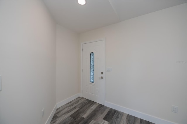 entryway with dark hardwood / wood-style floors