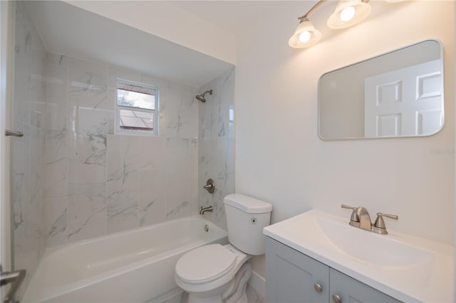 full bathroom featuring tiled shower / bath combo, vanity, and toilet