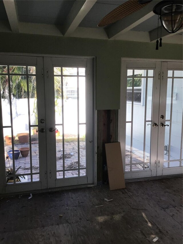 doorway with a healthy amount of sunlight and french doors