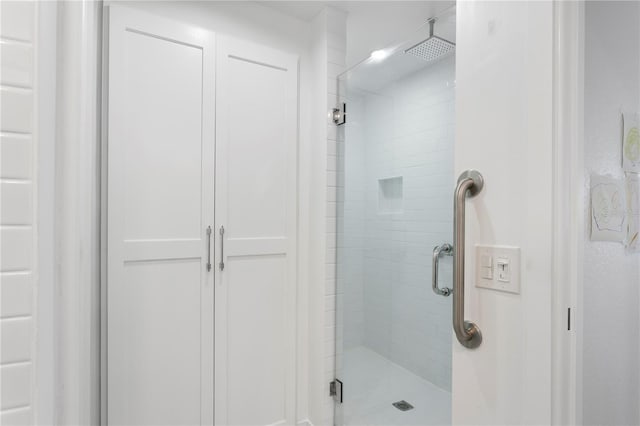 bathroom featuring walk in shower