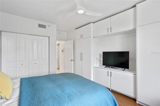 bedroom with ceiling fan and light wood-type flooring