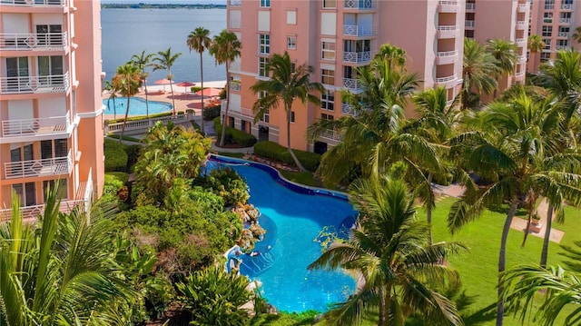 view of pool featuring a water view