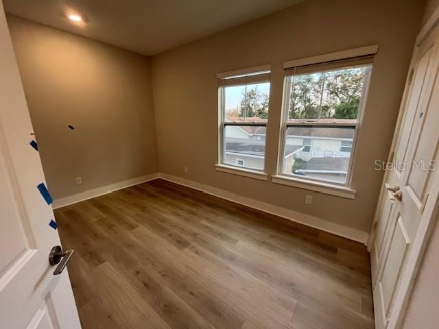 unfurnished room featuring light wood-type flooring