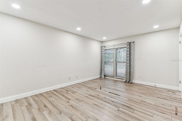 empty room featuring light hardwood / wood-style floors