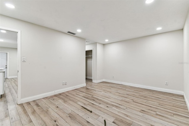 empty room featuring light hardwood / wood-style floors