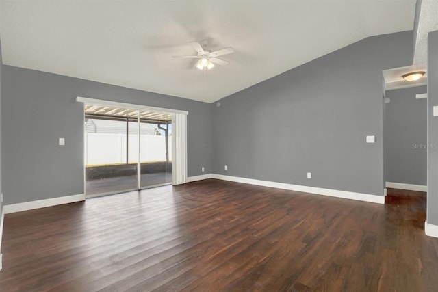 unfurnished room with lofted ceiling, baseboards, a ceiling fan, and dark wood-style flooring