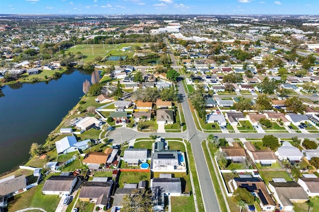 aerial view with a water view and a residential view