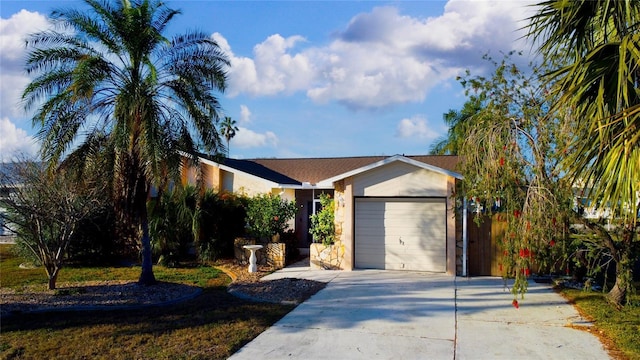 ranch-style house featuring a garage