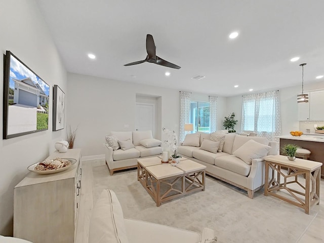 living room featuring ceiling fan