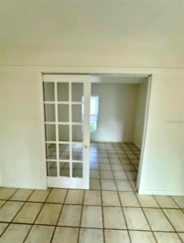 interior space featuring light tile patterned flooring