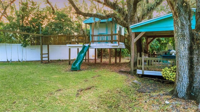 10501 Bridgewood Dr, Riverview, FL 33578 - playground at dusk with a lawn