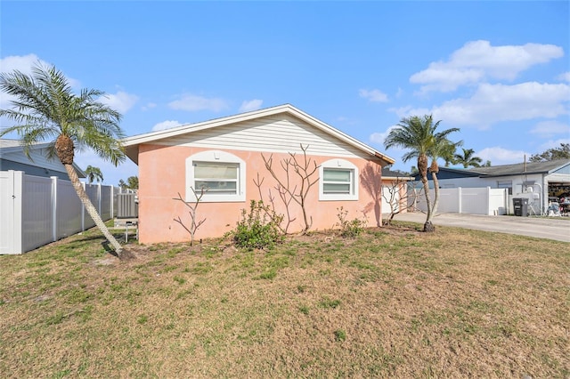 view of property exterior featuring a yard