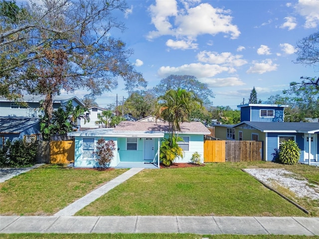 view of front of home with a front yard