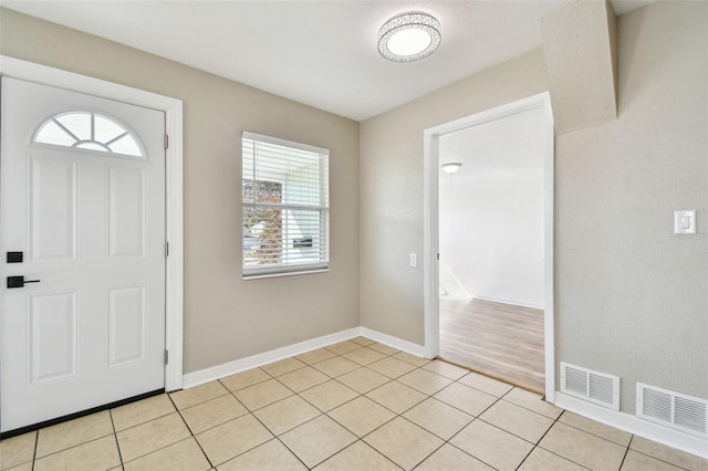 view of tiled foyer