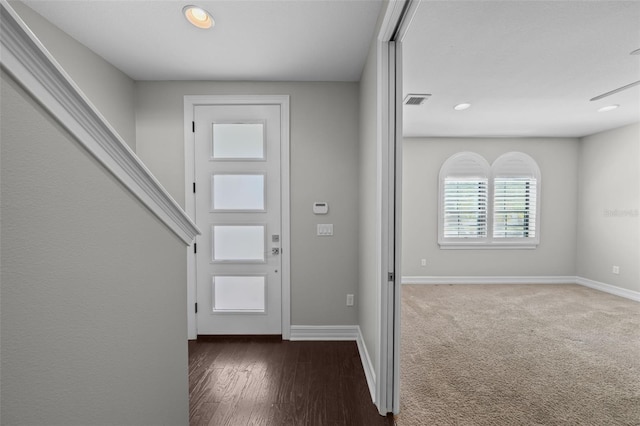 foyer with dark wood-type flooring