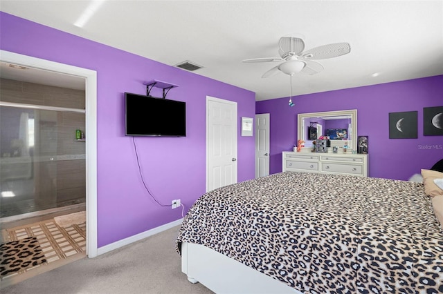 9911 Antilles Dr, Seminole, FL 33776 - bedroom featuring visible vents, a ceiling fan, light carpet, connected bathroom, and baseboards