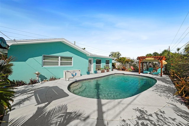 9911 Antilles Dr, Seminole, FL 33776 - outdoor pool featuring a patio and a pergola