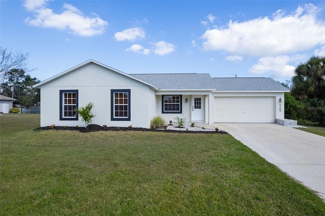 single story home with a garage and a front lawn