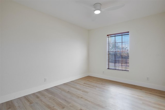 unfurnished room with ceiling fan and light hardwood / wood-style flooring