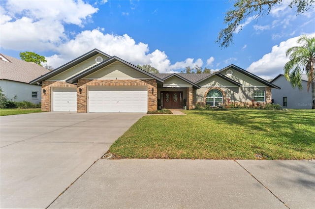 view of front of home with a garage and a front lawn