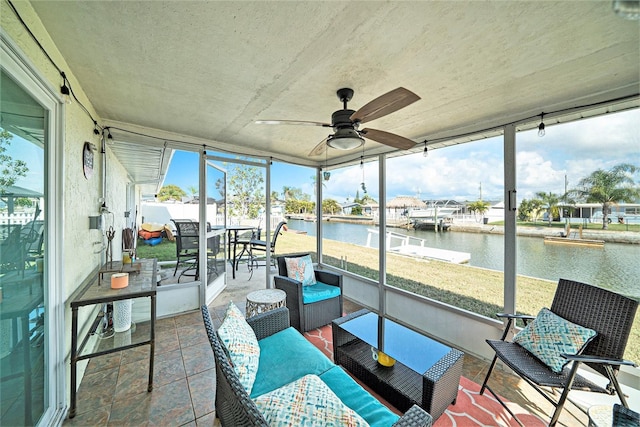 13614 Evelane Dr, Hudson, FL 34667 - sunroom featuring a water view, a ceiling fan, an outdoor hangout area, and outdoor dining area
