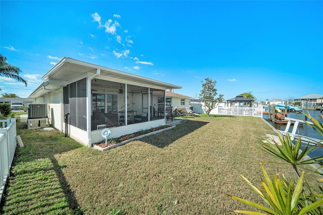 13614 Evelane Dr, Hudson, FL 34667 - back of house featuring a gazebo and a sunroom