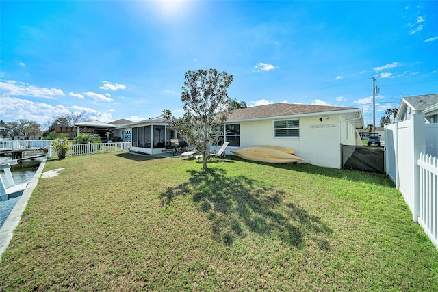 13614 Evelane Dr, Hudson, FL 34667 - rear view of property featuring a sunroom and stucco siding
