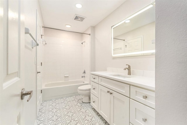 bathroom with recessed lighting, visible vents, toilet, vanity, and  shower combination