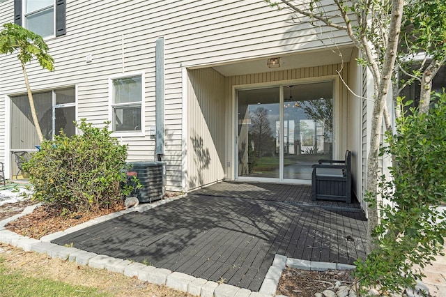 doorway to property with central air condition unit