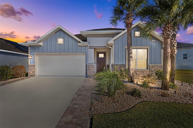 view of front of property featuring a garage