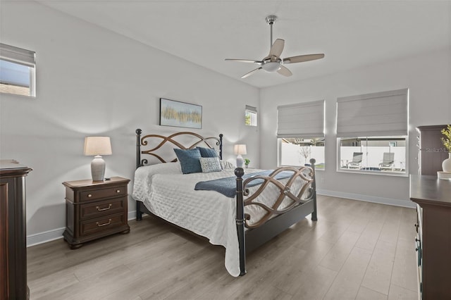 bedroom featuring ceiling fan and light wood-type flooring