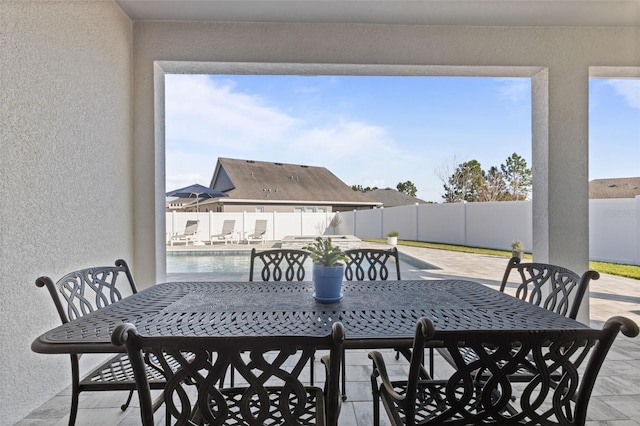 exterior space featuring a fenced in pool