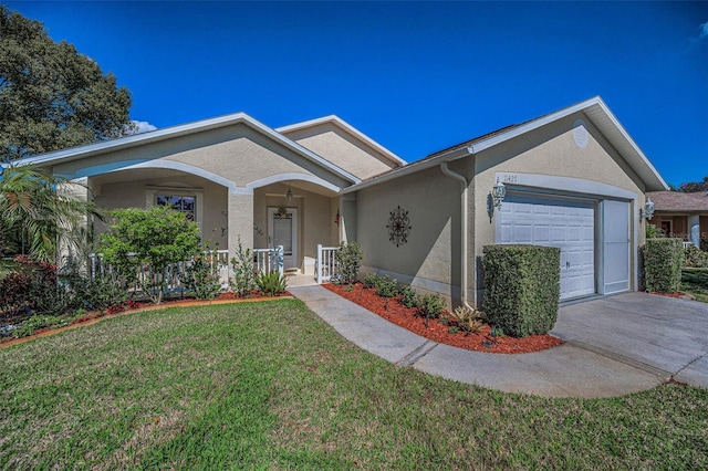 ranch-style house featuring a porch, a front lawn, an attached garage, and stucco siding