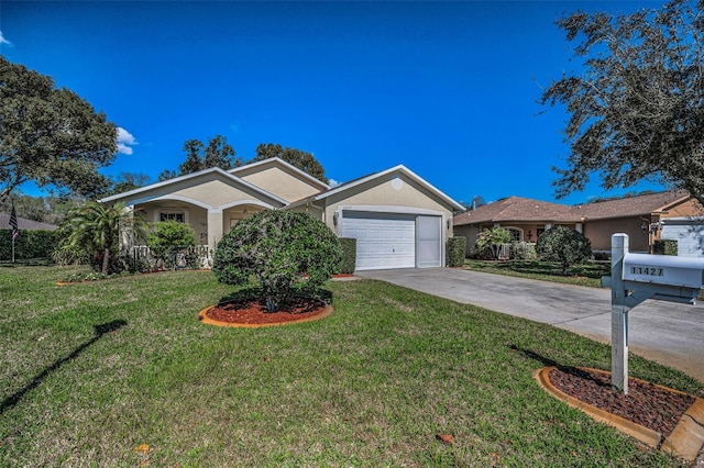 single story home with a garage, a front yard, driveway, and stucco siding